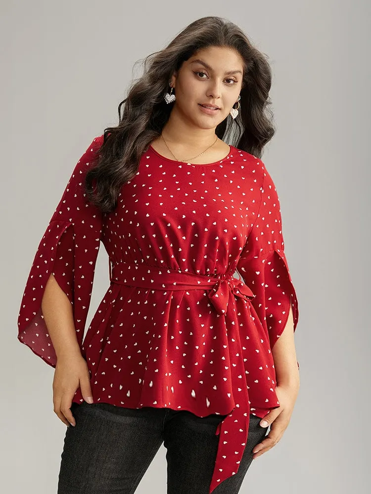 Heart Print Belted Petal Sleeve High Low Hem Blouse sold by Bloomchic