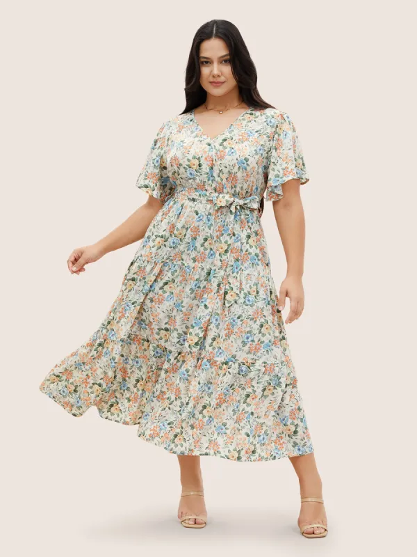 Floral Overlap Collar Ruffle Sleeve Belted Dress sold by Bloomchic