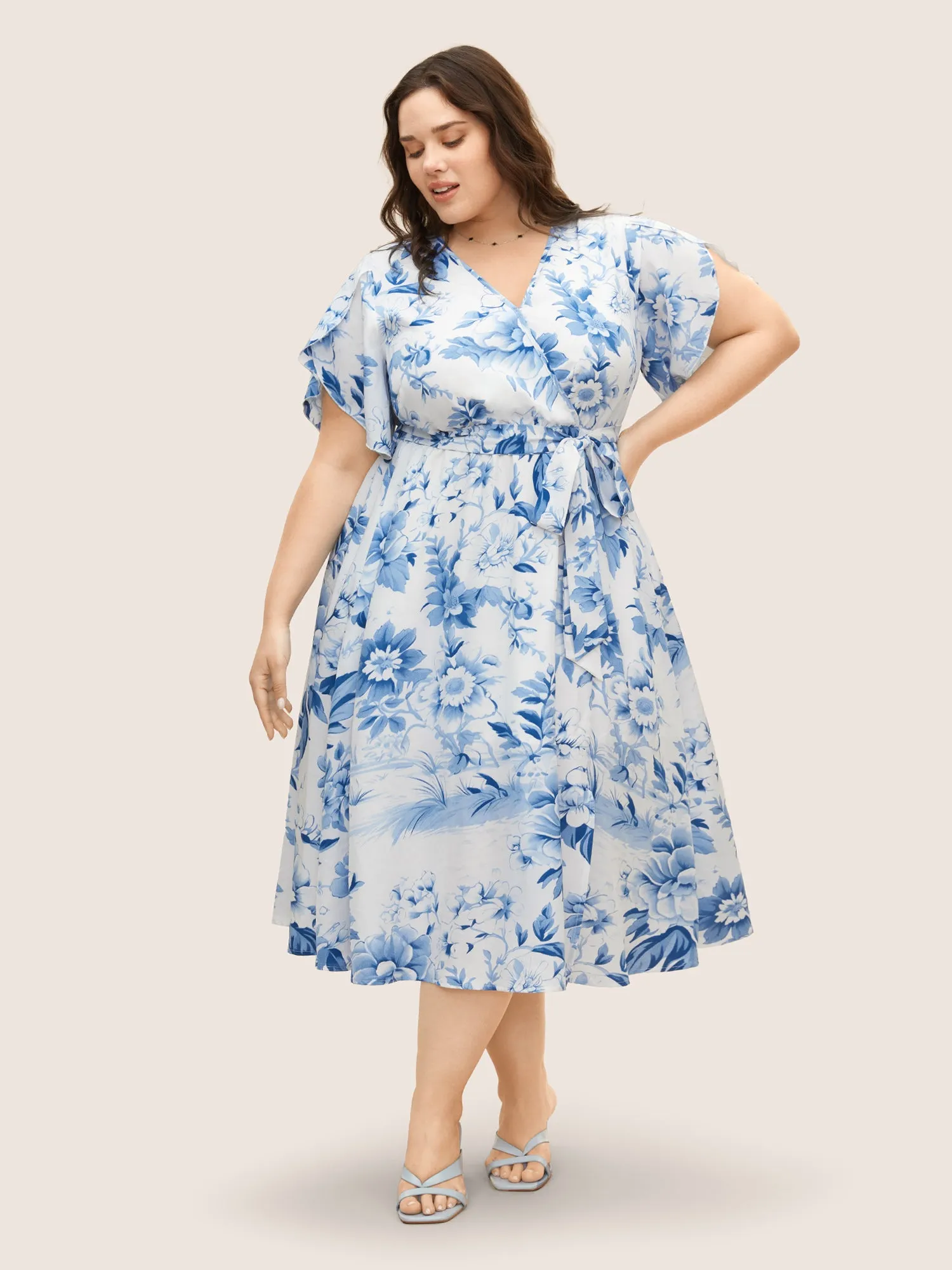 Floral Wrap Petal Sleeve Belted Dress sold by Bloomchic