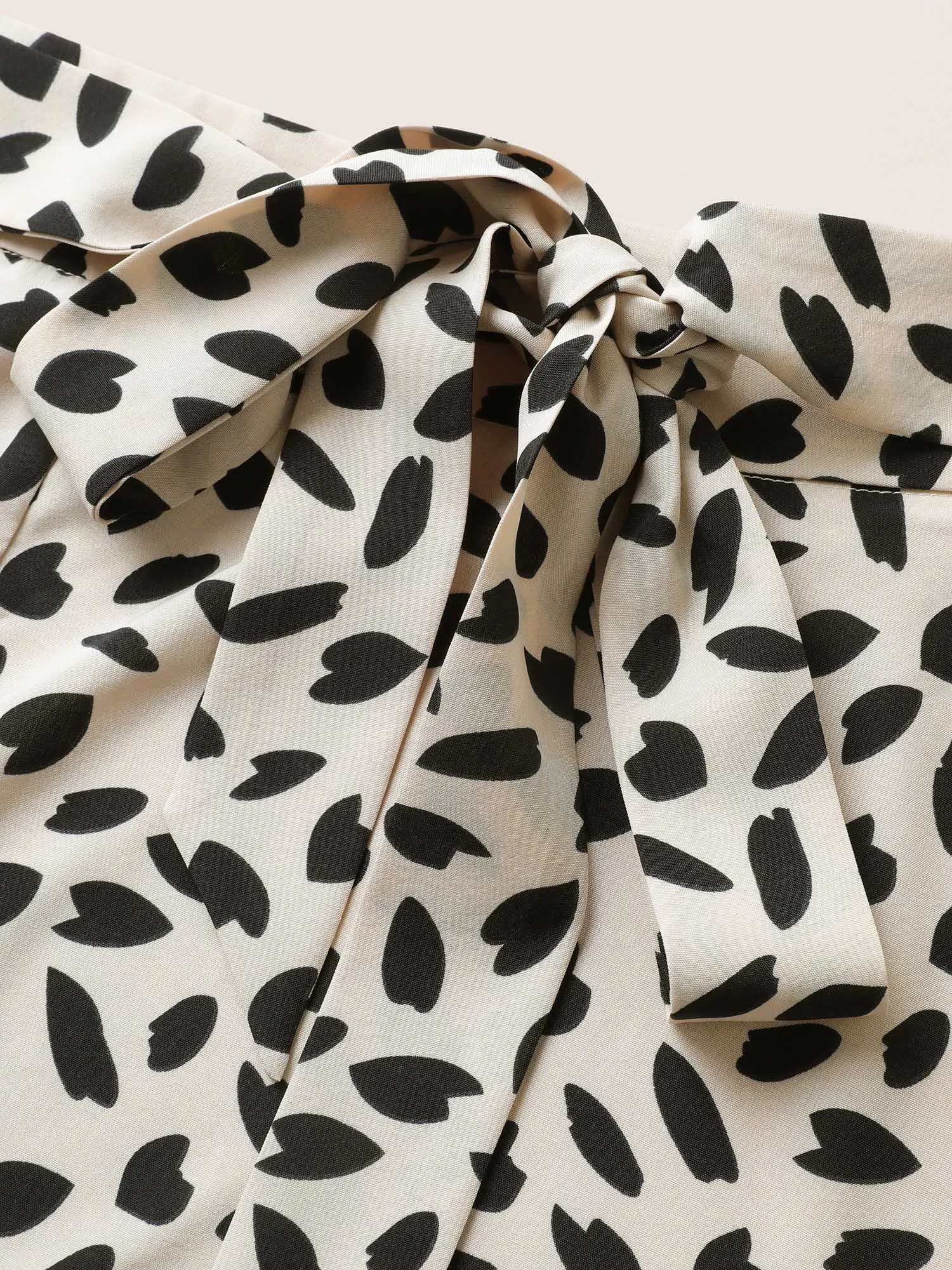 Graphic Ties Knotted Wrap Hem Skirt sold by Bloomchic product image thumbnail 5