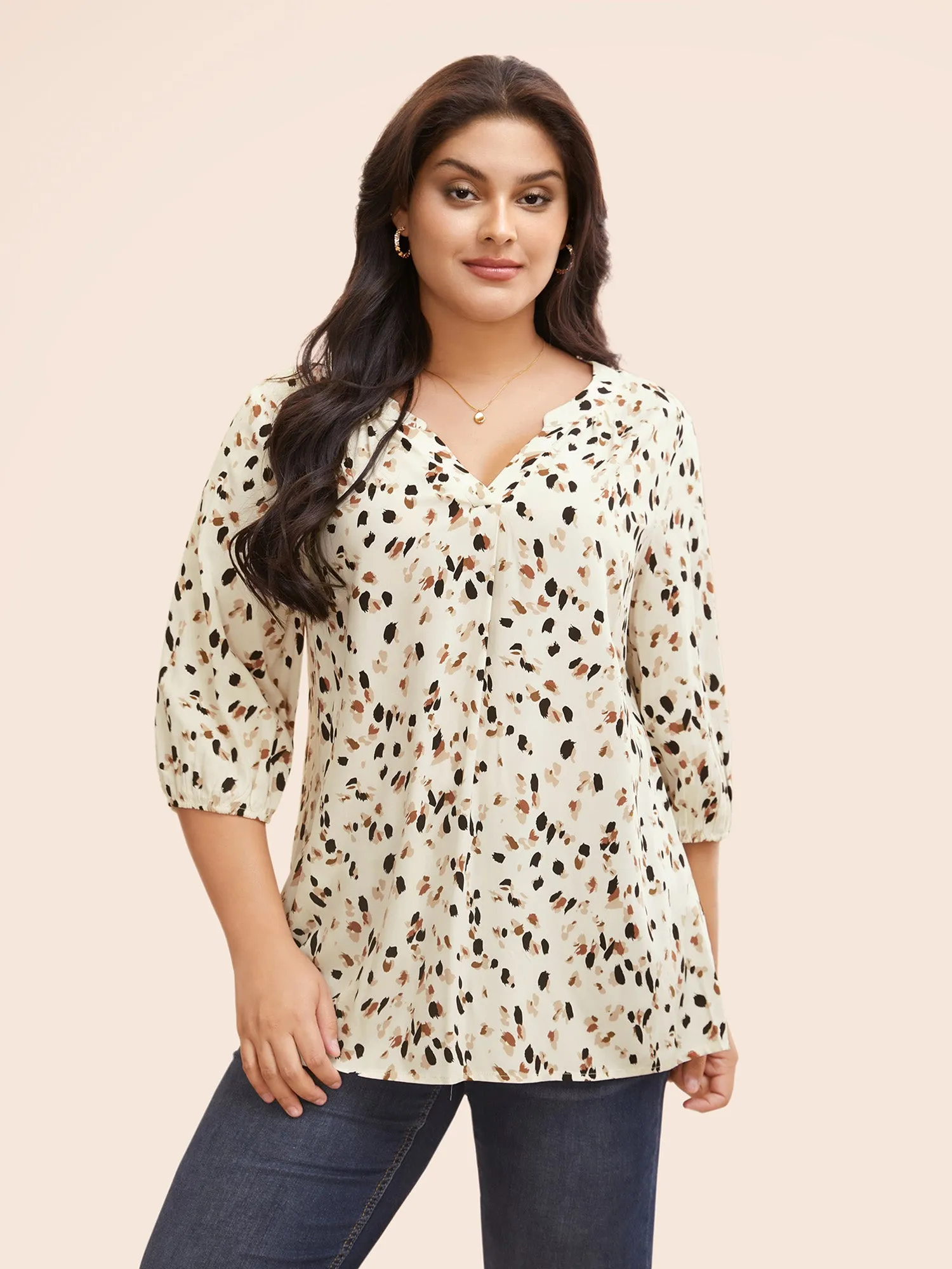 Allover Print Notched Lantern Sleeve Blouse sold by Bloomchic