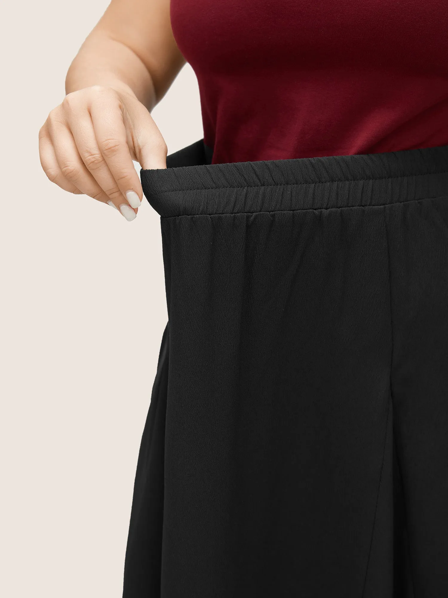 Plain Asymmetrical Flutter Hem Elastic Waist Skirt sold by Bloomchic product image thumbnail 3