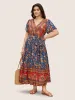 Bandana Surplice Neck Pocket Belted Flutter Hem Maxi Dress sold by Bloomchic