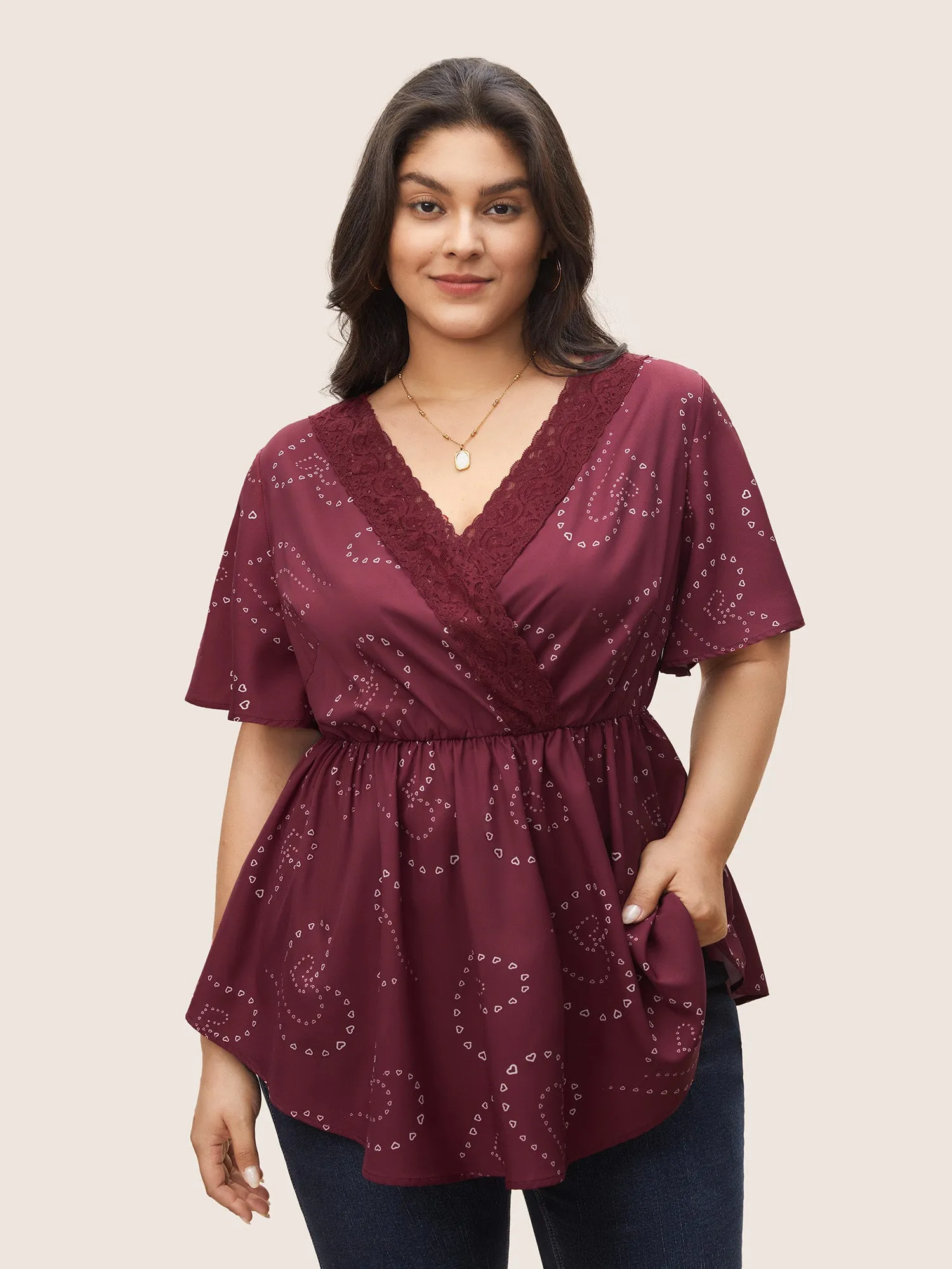 Heart Lace Patchwork Wrap Elastic Waist Blouse sold by Bloomchic