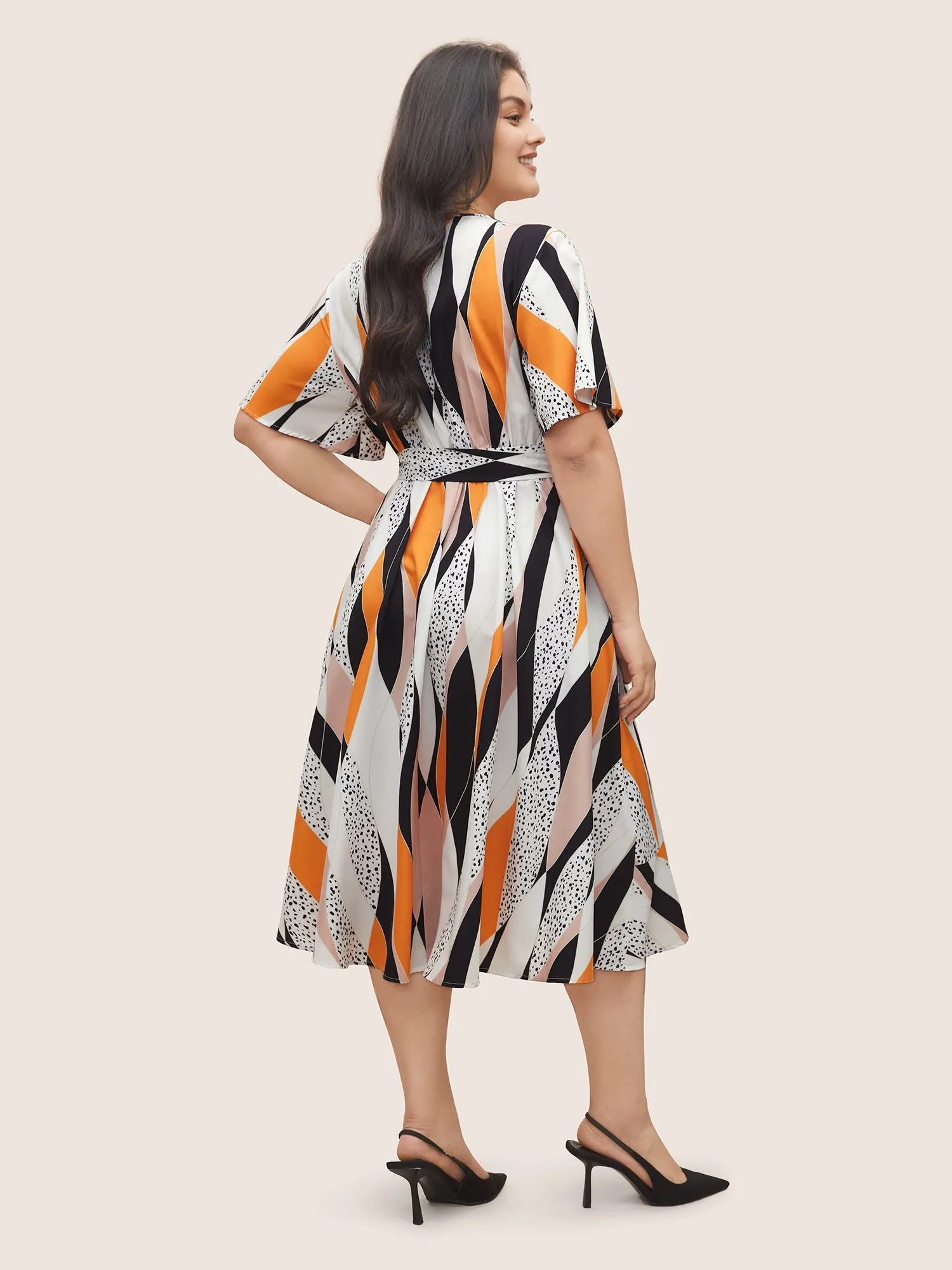 Geometric Contrast Overlap Collar Belted Ruffle Sleeve Dress sold by Bloomchic product image thumbnail 2