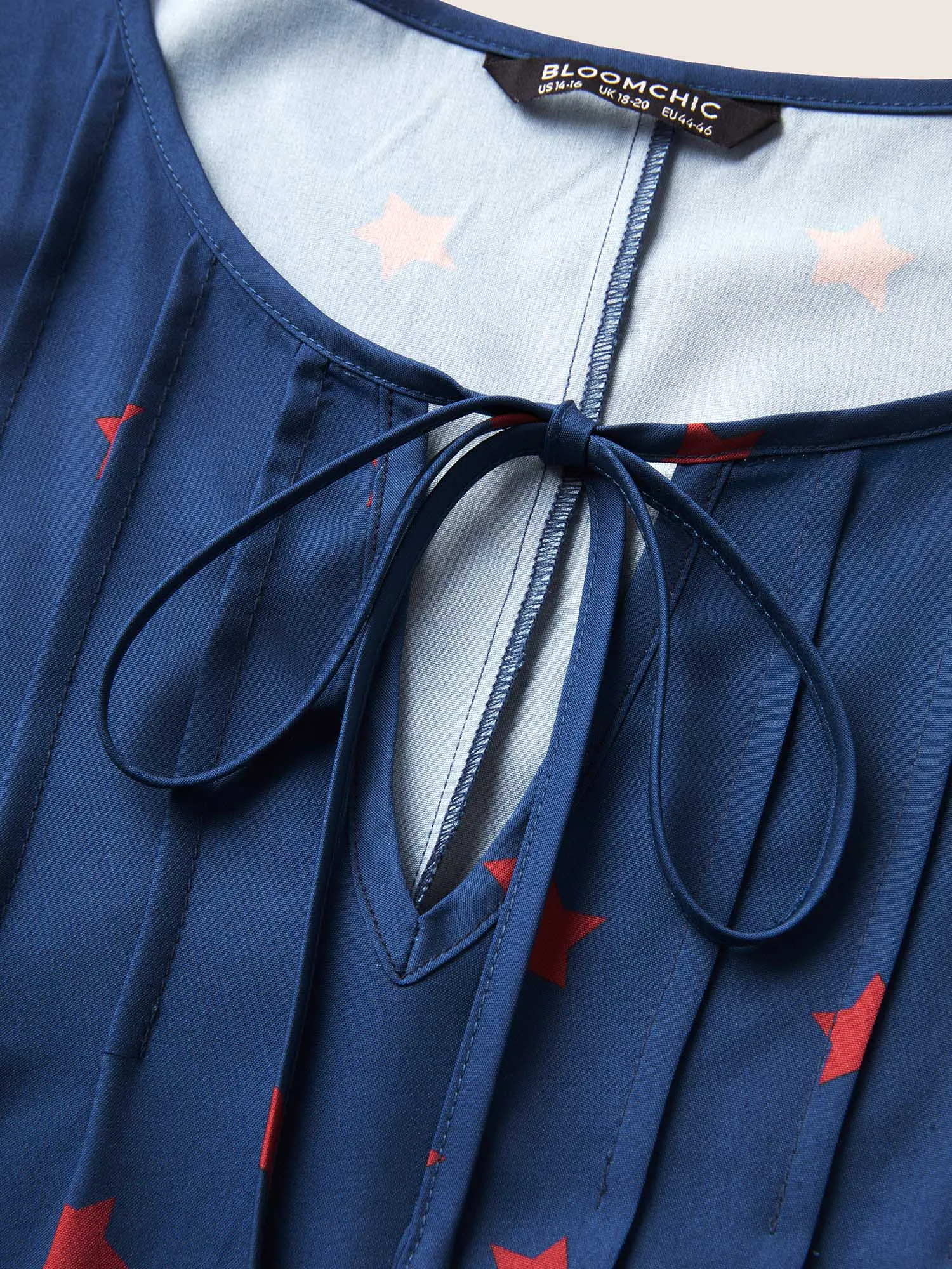 Star Pleated Tie Knot Ruffle Sleeve Dress sold by Bloomchic product image thumbnail 5