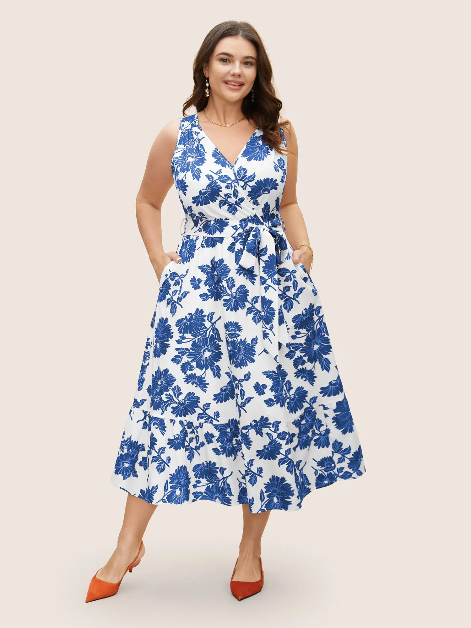 Overlap Collar Floral Sleeveless Belted Dress sold by Bloomchic