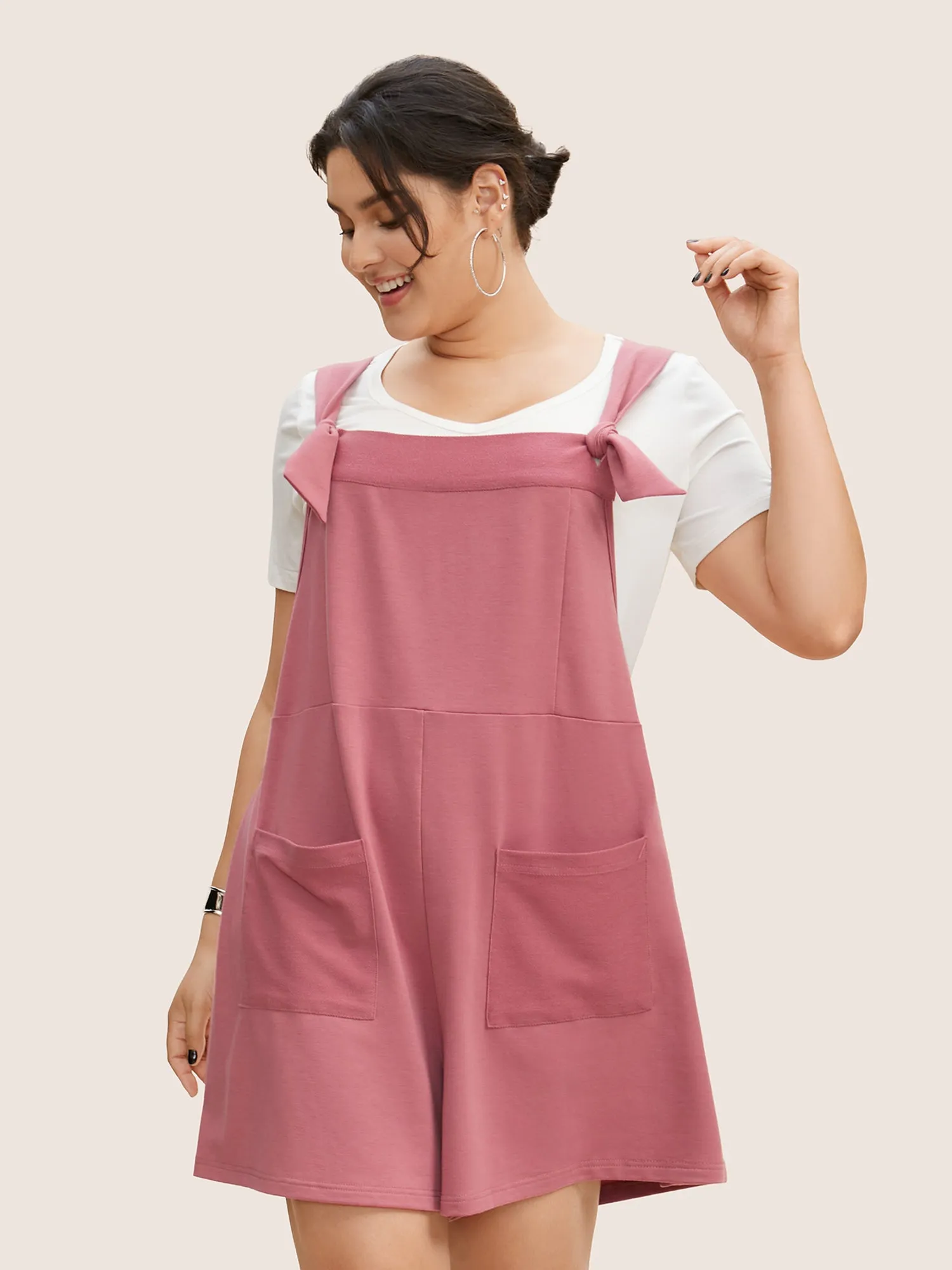 Solid Tie Knot Patched Pocket Romper sold by Bloomchic