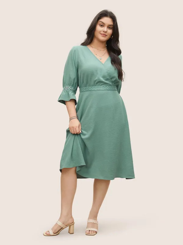 Solid Eyelet Lace Surplice Neck Ruffle Sleeve Dress sold by Bloomchic