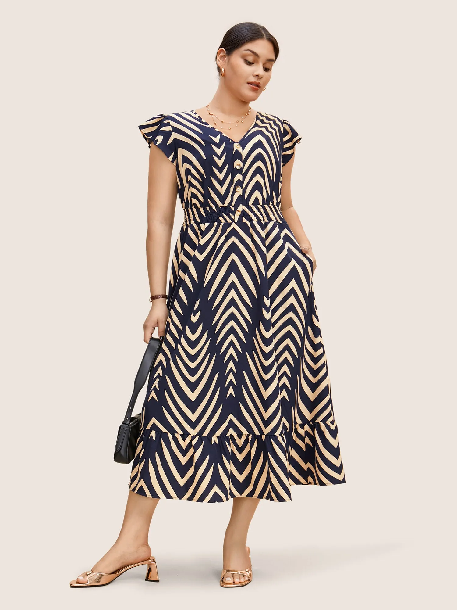 Striped Shirred Button Detail Ruffle Cap Sleeve Dress sold by Bloomchic