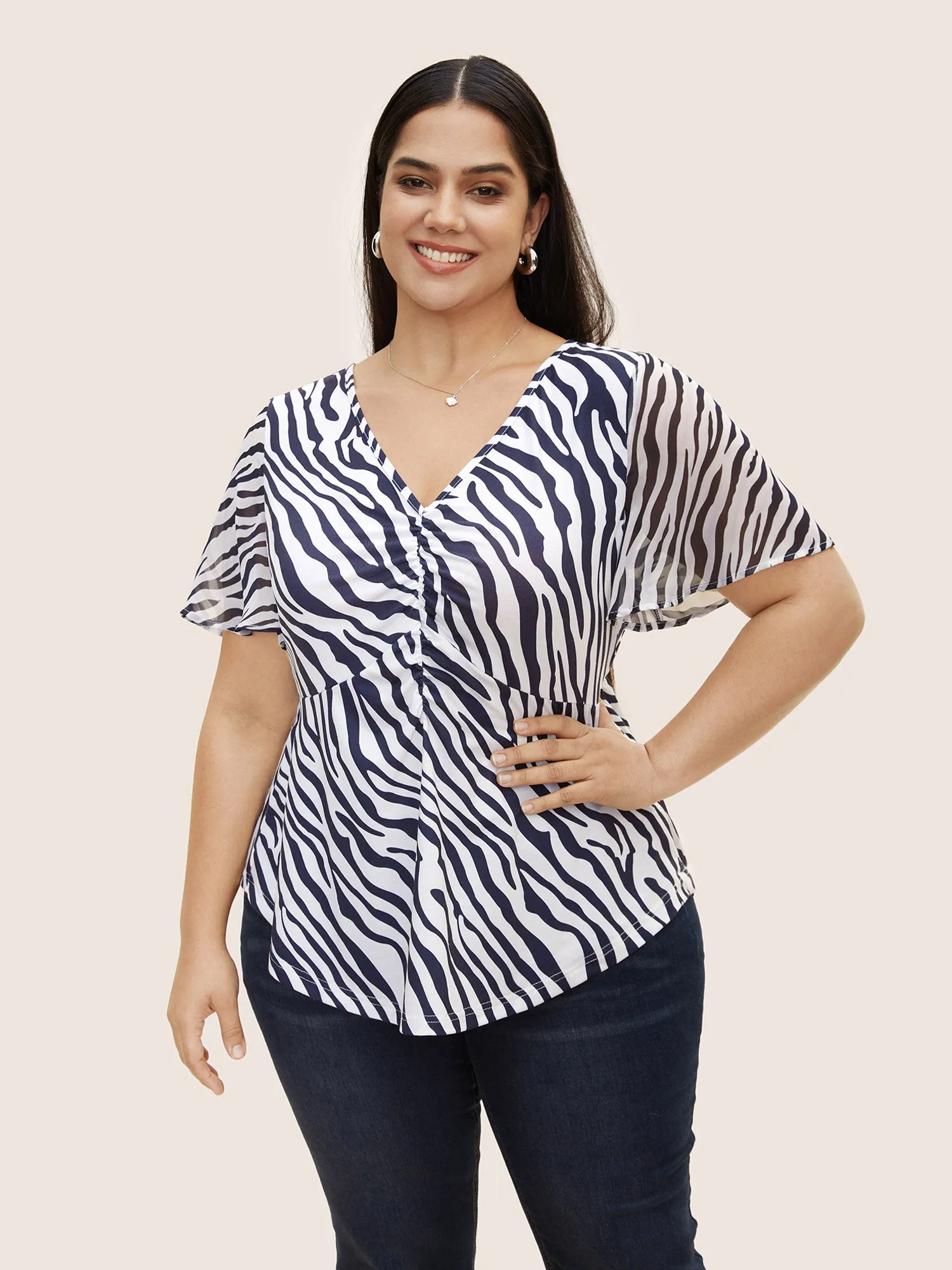 Zebra Print Patchwork Chiffon Curved Hem Blouse sold by Bloomchic