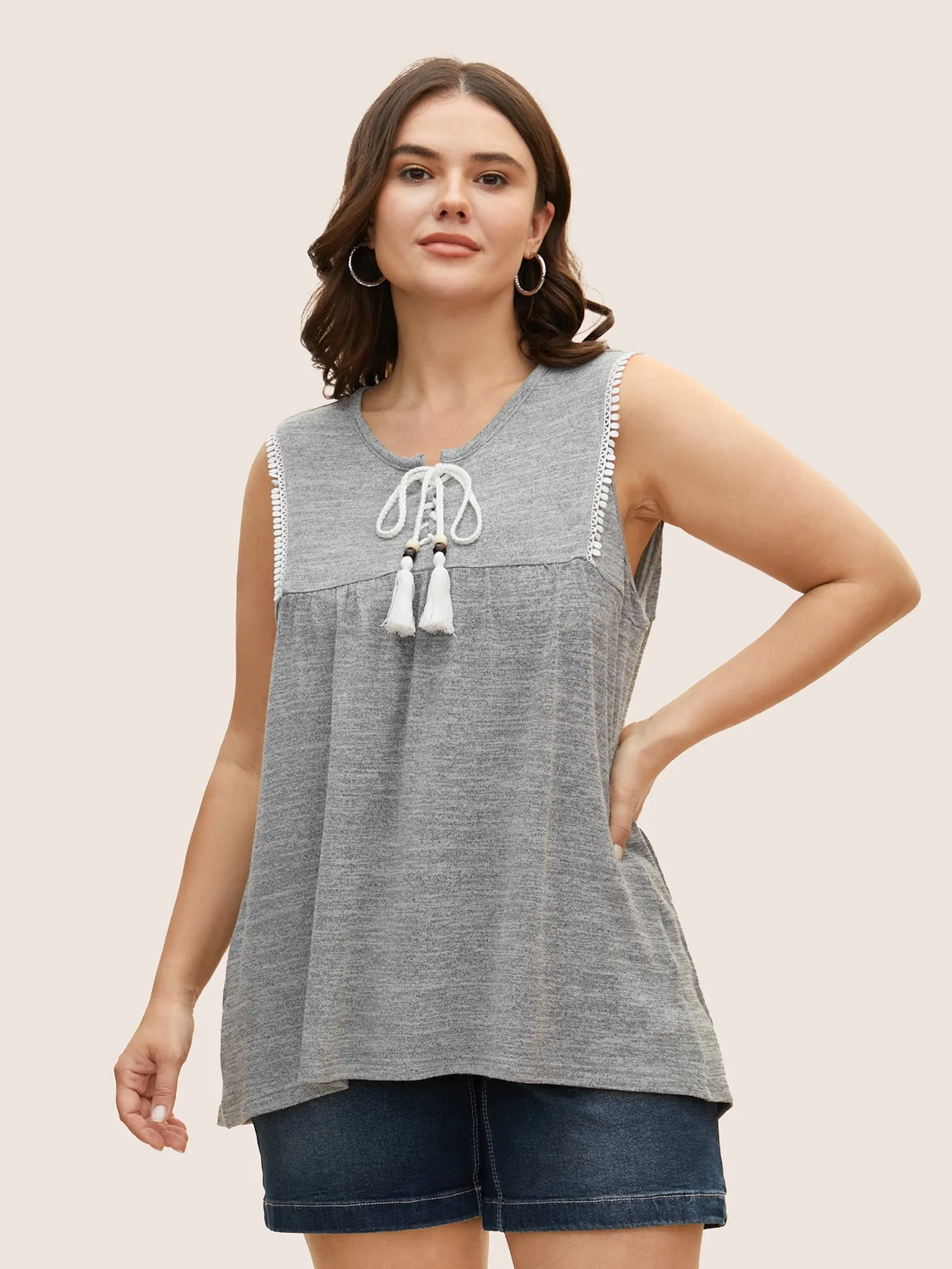 Textured Lace Up Tassel Pompom Trim Tank Top sold by Bloomchic