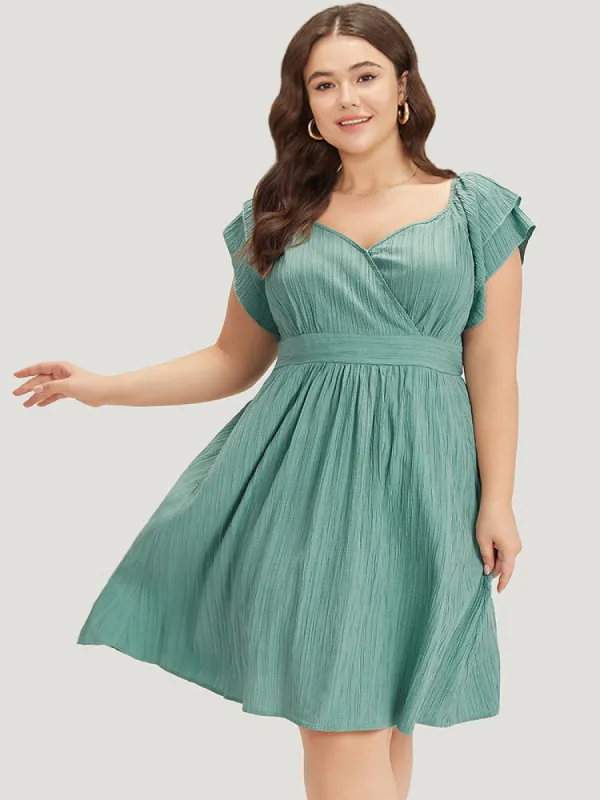Plain Textured Pocket Layered Sleeve Wrap Dress sold by Bloomchic