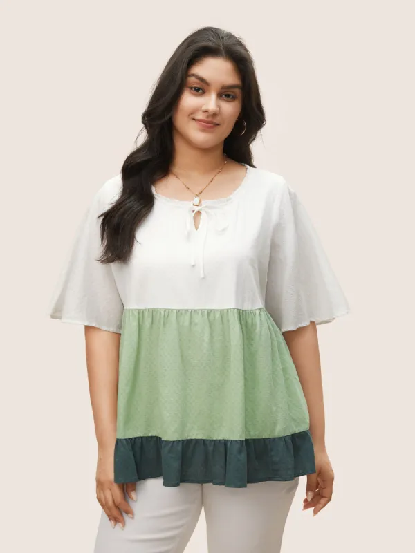 Contrast Knot Neck Ruffle Layered Hem Blouse sold by Bloomchic
