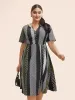 Notched Geometric Patchwork Contrast Midi Dress sold by Bloomchic