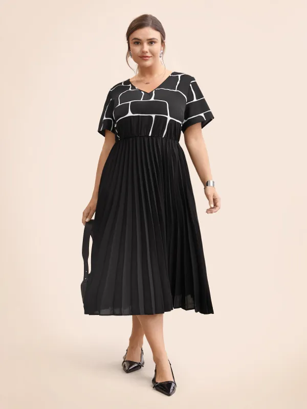 Geometric Patchwork Pleated Midi Dress sold by Bloomchic