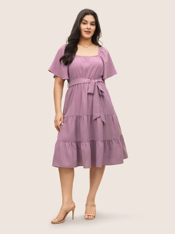 Plain Textured Ruffle Layered Hem Belted Dress sold by Bloomchic