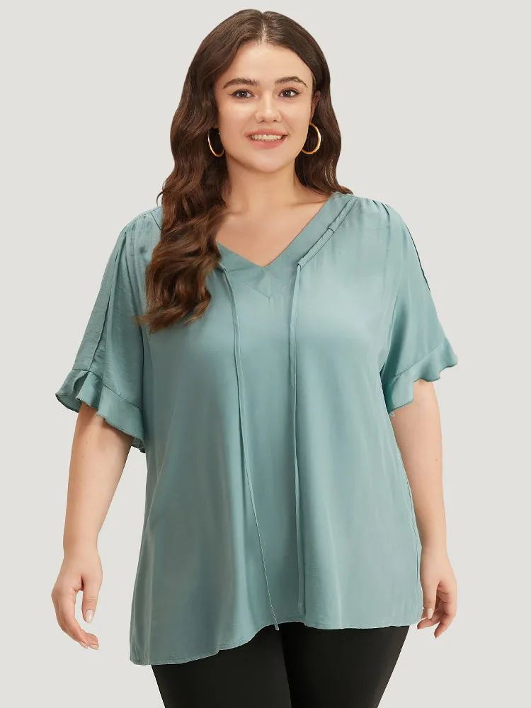 Solid Knot V Neck Ruffle Sleeve Blouse sold by Bloomchic