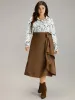 Anti-Wrinkle Solid Asymmetrical Hem Ties Skirt sold by Bloomchic