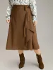 Anti-Wrinkle Solid Asymmetrical Hem Ties Skirt sold by Bloomchic