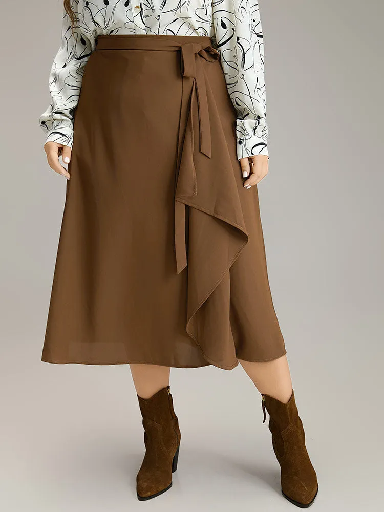 Anti-Wrinkle Solid Asymmetrical Hem Ties Skirt sold by Bloomchic