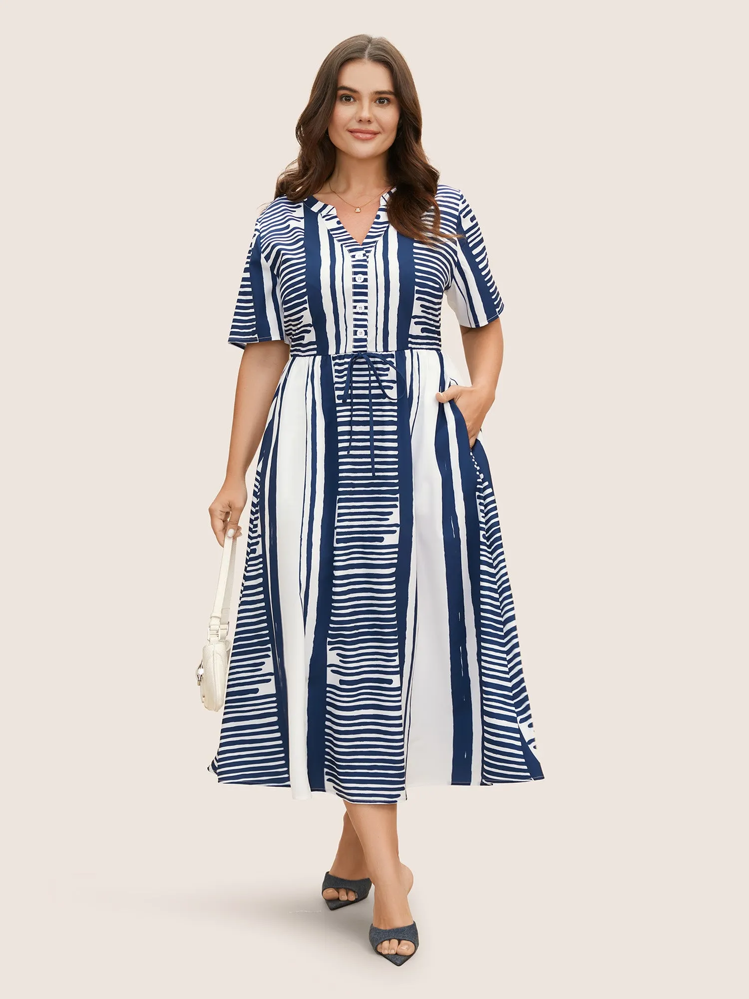 Notched Collar Striped Patchwork Drawstring Dress sold by Bloomchic