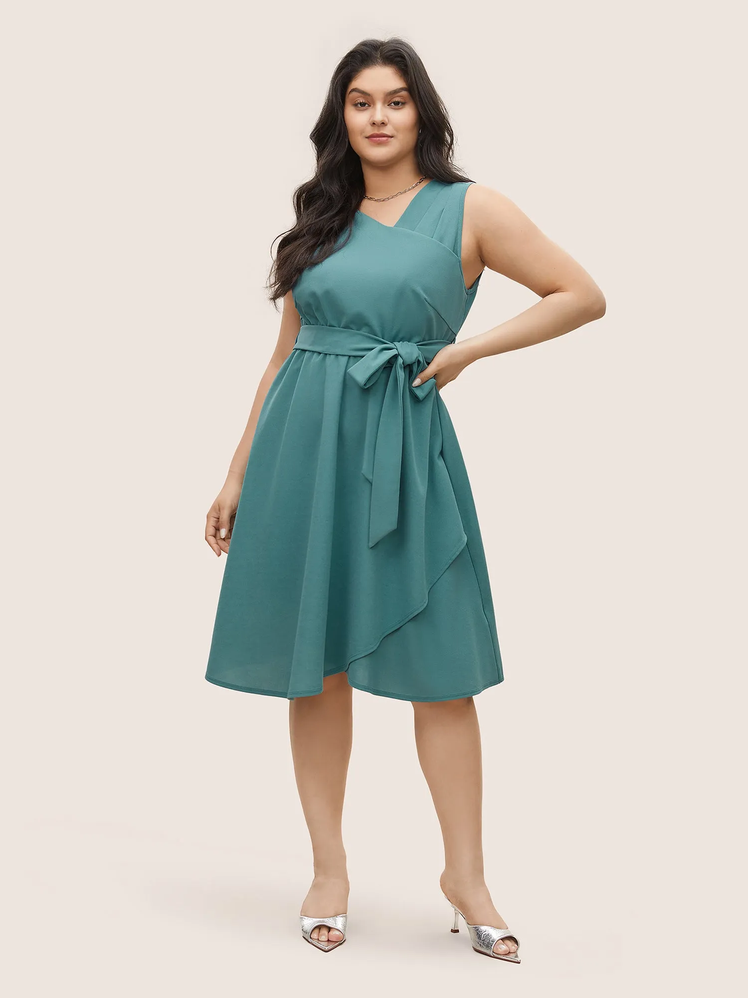 Asymmetrical Neck Pleated Belted Sleeveless Dress sold by Bloomchic