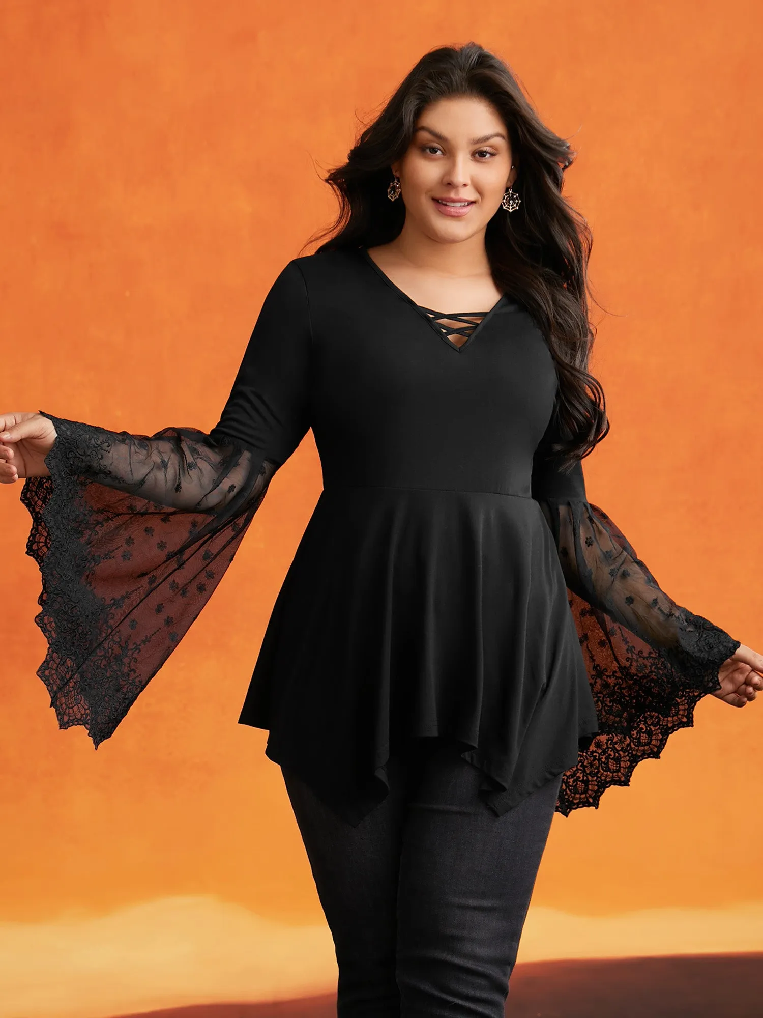 Cross Front Bell Sleeve Top sold by Bloomchic