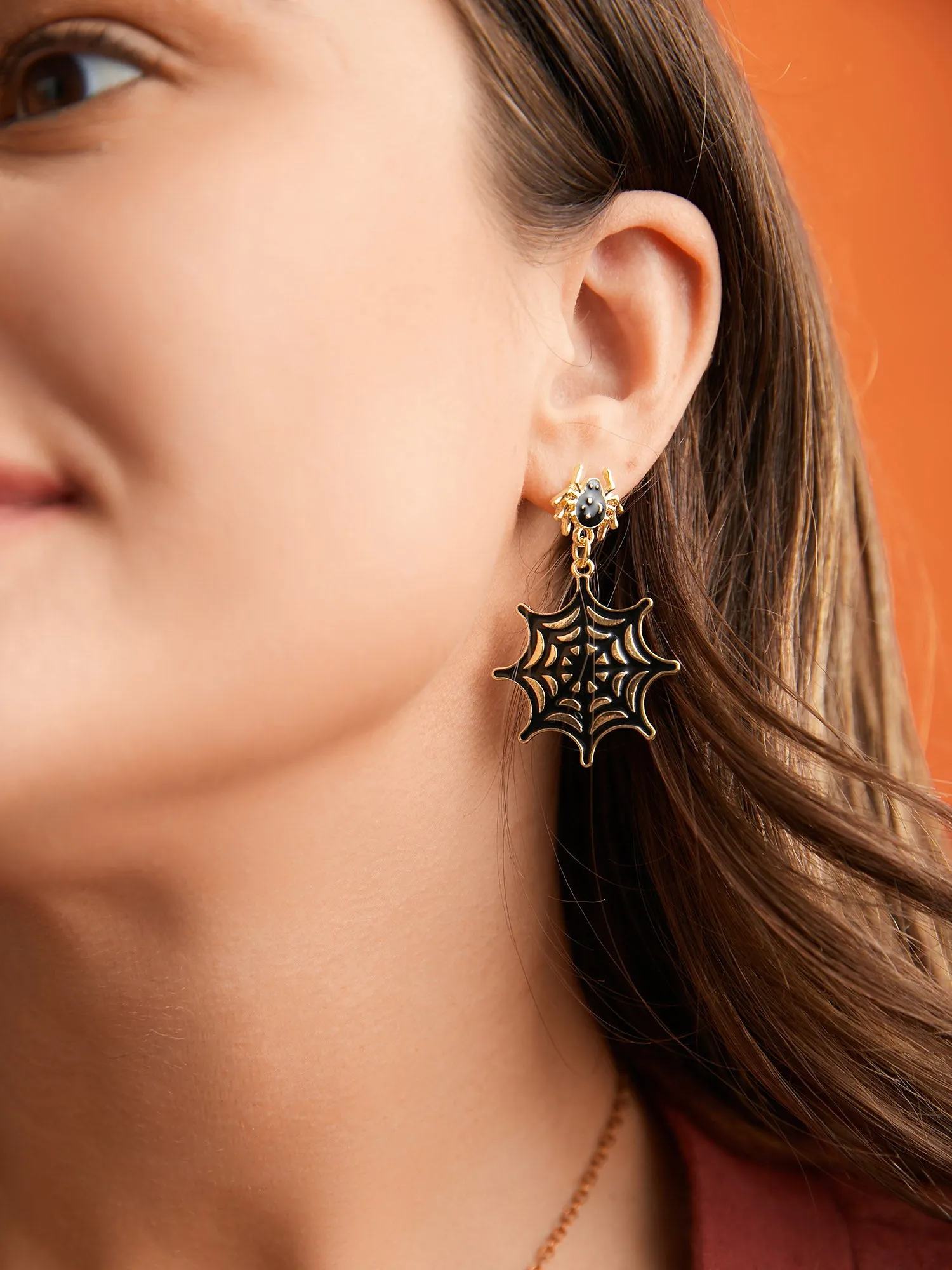 Spider Web Gold Dangle Earrings sold by Bloomchic