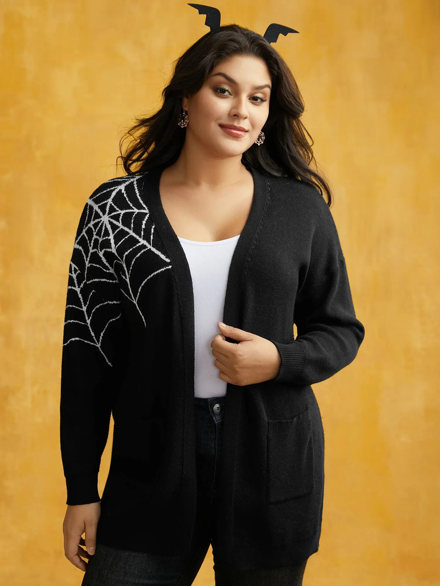 After Midnight Bat Jacquard Printed Cardigan sold by Bloomchic