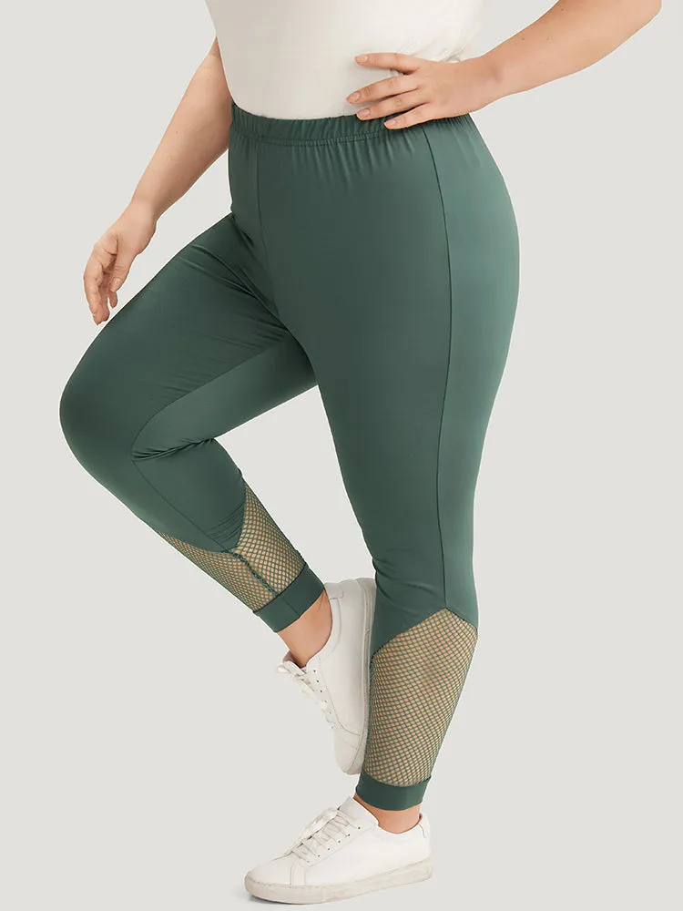 Solid Patchwork Cut Out Elastic Waist Leggings sold by Bloomchic product image thumbnail 2