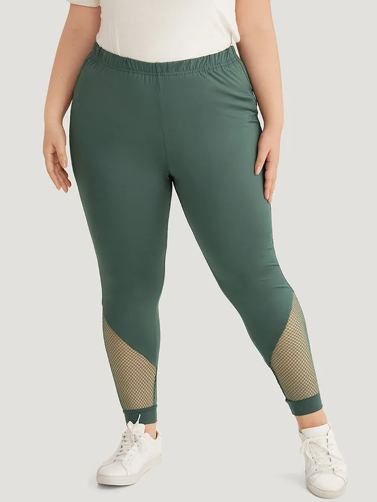 Solid Patchwork Cut Out Elastic Waist Leggings sold by Bloomchic product image thumbnail 3