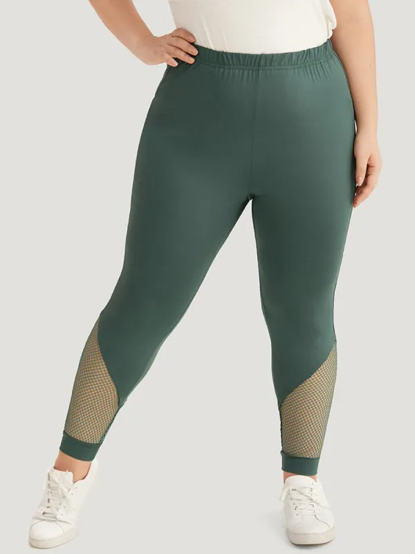 Solid Patchwork Cut Out Elastic Waist Leggings sold by Bloomchic