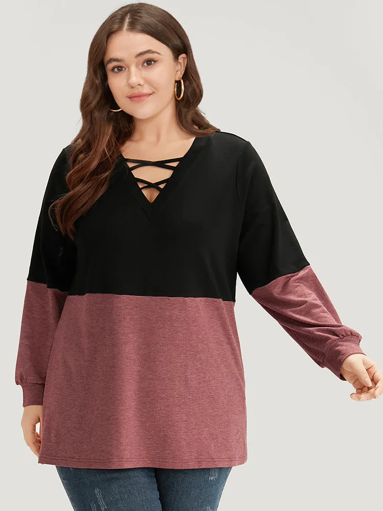 Two Tone Patchwork Elastic Cuffs Crisscross Sweatshirt sold by Bloomchic