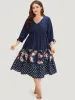 Polka Dot Patchwork Floral Knot Pocket Lantern Sleeve Dress sold by Bloomchic