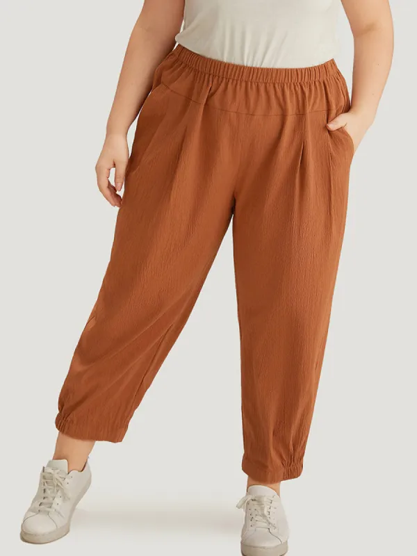 Plain Texture Pocket Elastic Waist Gathered Pants sold by Bloomchic