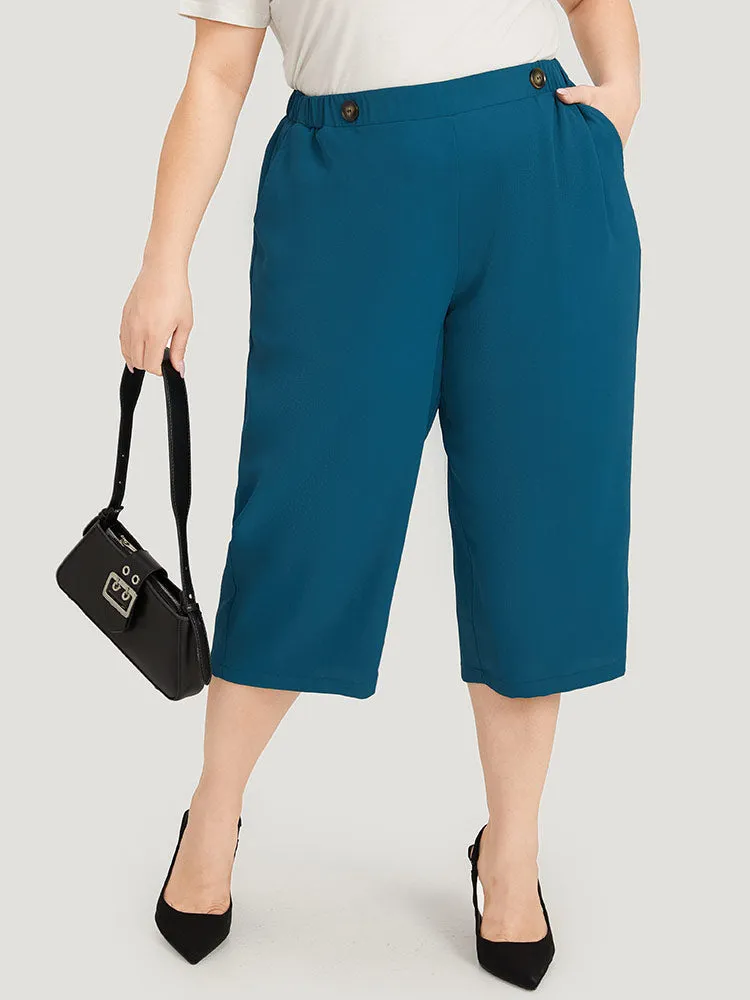 Solid Pocket Elastic Waist Button Detail Pants sold by Bloomchic