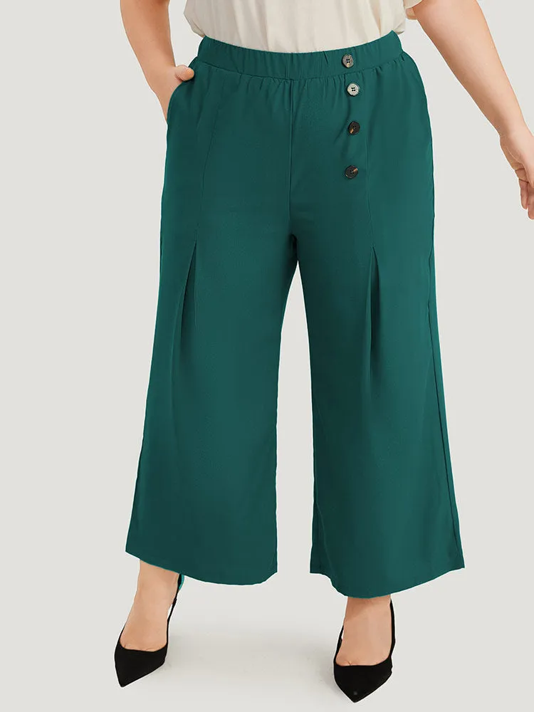 Solid Pleated Button Detail Straight Leg Pants sold by Bloomchic