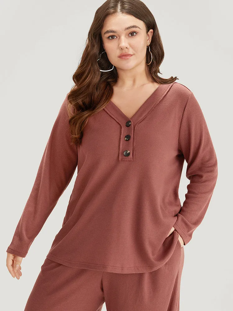 Solid Waffle Knit V Neck Button Up Woven Top sold by Bloomchic