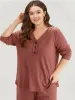 Solid Waffle Knit V Neck Button Up Woven Top sold by Bloomchic