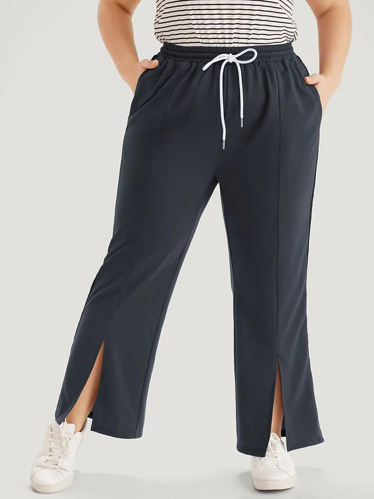 Contrast Patchwork Pocket Drawstring Split Hem Sweatpants sold by Bloomchic