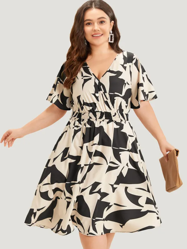 Geometric Print Pocket Surplice Neck Shirred Dress sold by Bloomchic