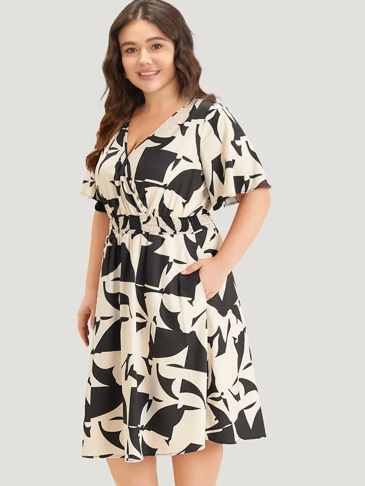 Geometric Print Pocket Surplice Neck Shirred Dress sold by Bloomchic product image thumbnail 2