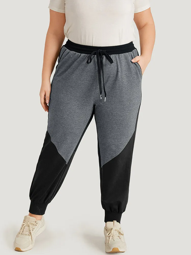 Contrast Patchwork Pocket Drawstring Elastic Waist Sweatpants sold by Bloomchic