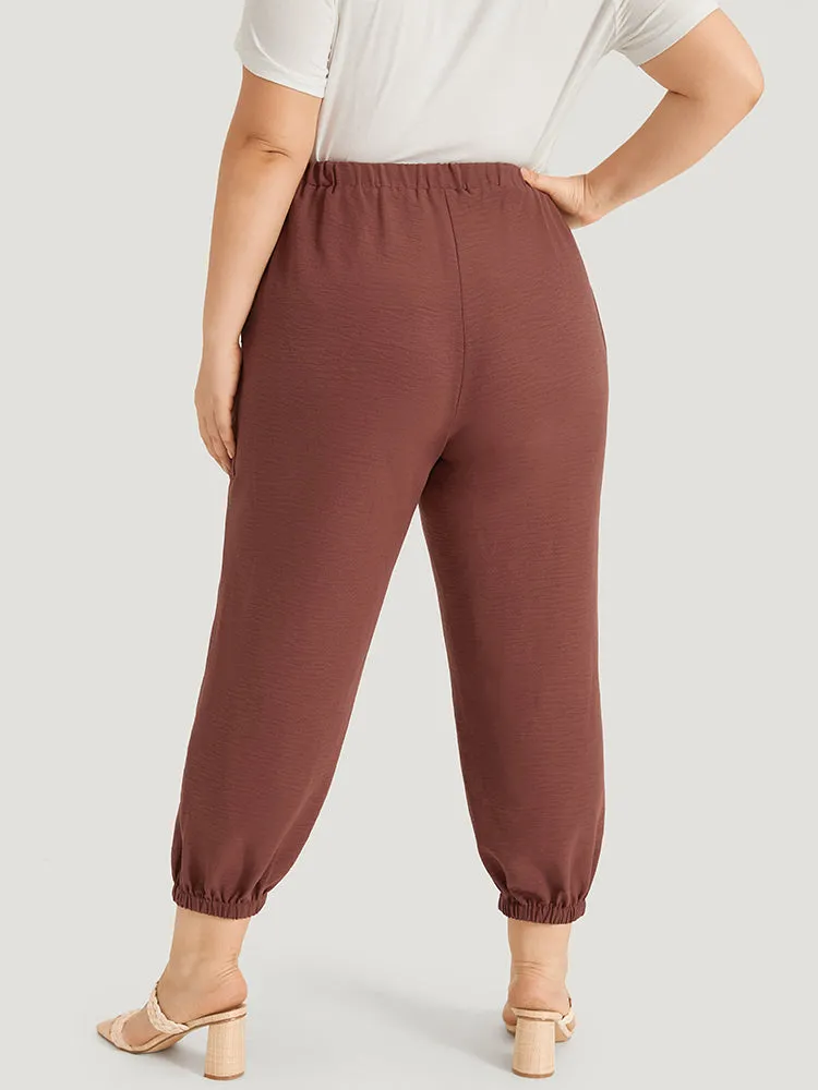 Solid Patched Pocket Bowknot Button Detail Pants sold by Bloomchic product image thumbnail 5