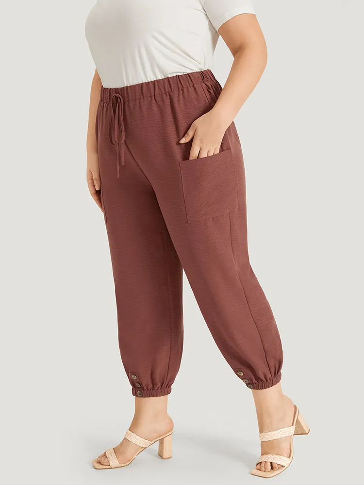 Solid Patched Pocket Bowknot Button Detail Pants sold by Bloomchic product image thumbnail 3
