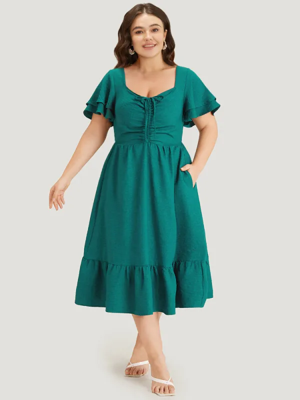 Solid Drawstring Pocket Ruffle Trim Layered Dress sold by Bloomchic