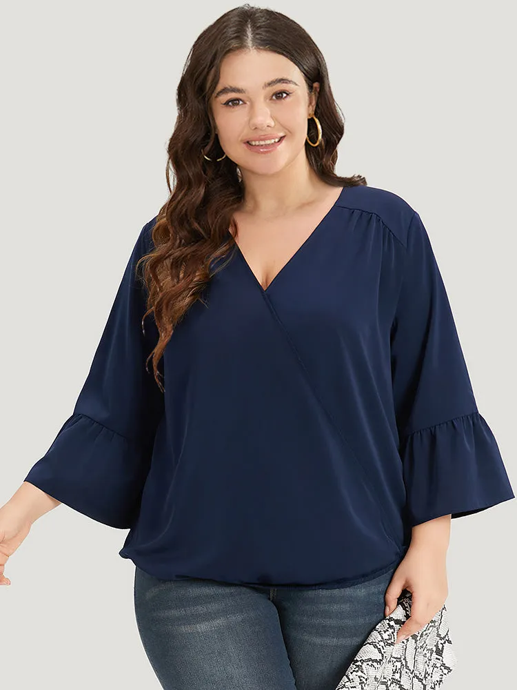 Anti-Wrinkle Plain Surplice Neck Bell Sleeve Blouse sold by Bloomchic