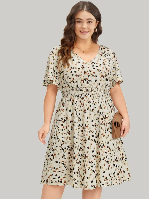 Allover Print Shirred Pocket V Neck Dress sold by Bloomchic