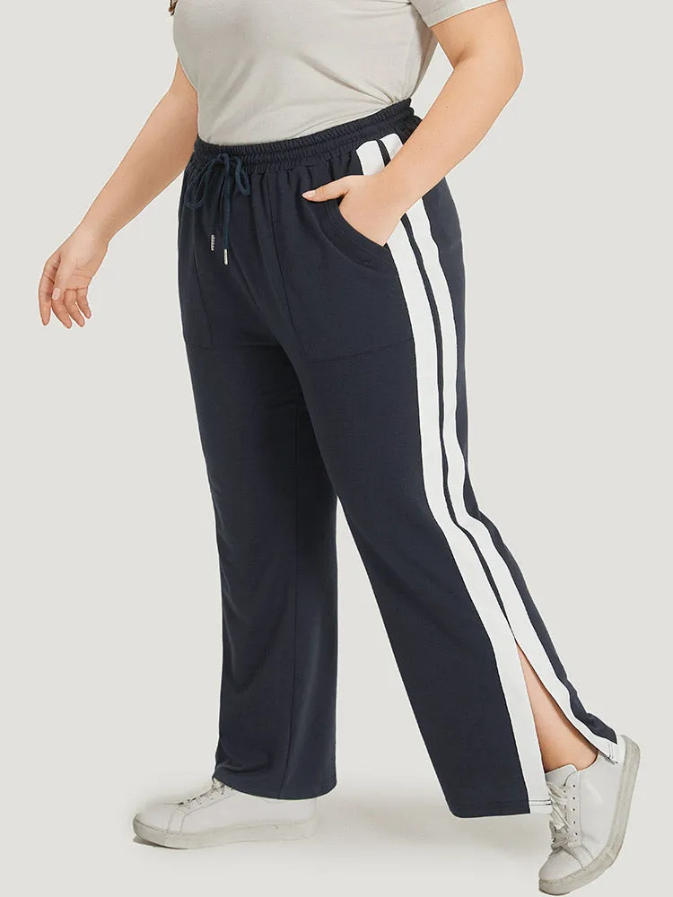 Two Tone Slant Pocket Bowknot Split Side Sweatpant sold by Bloomchic